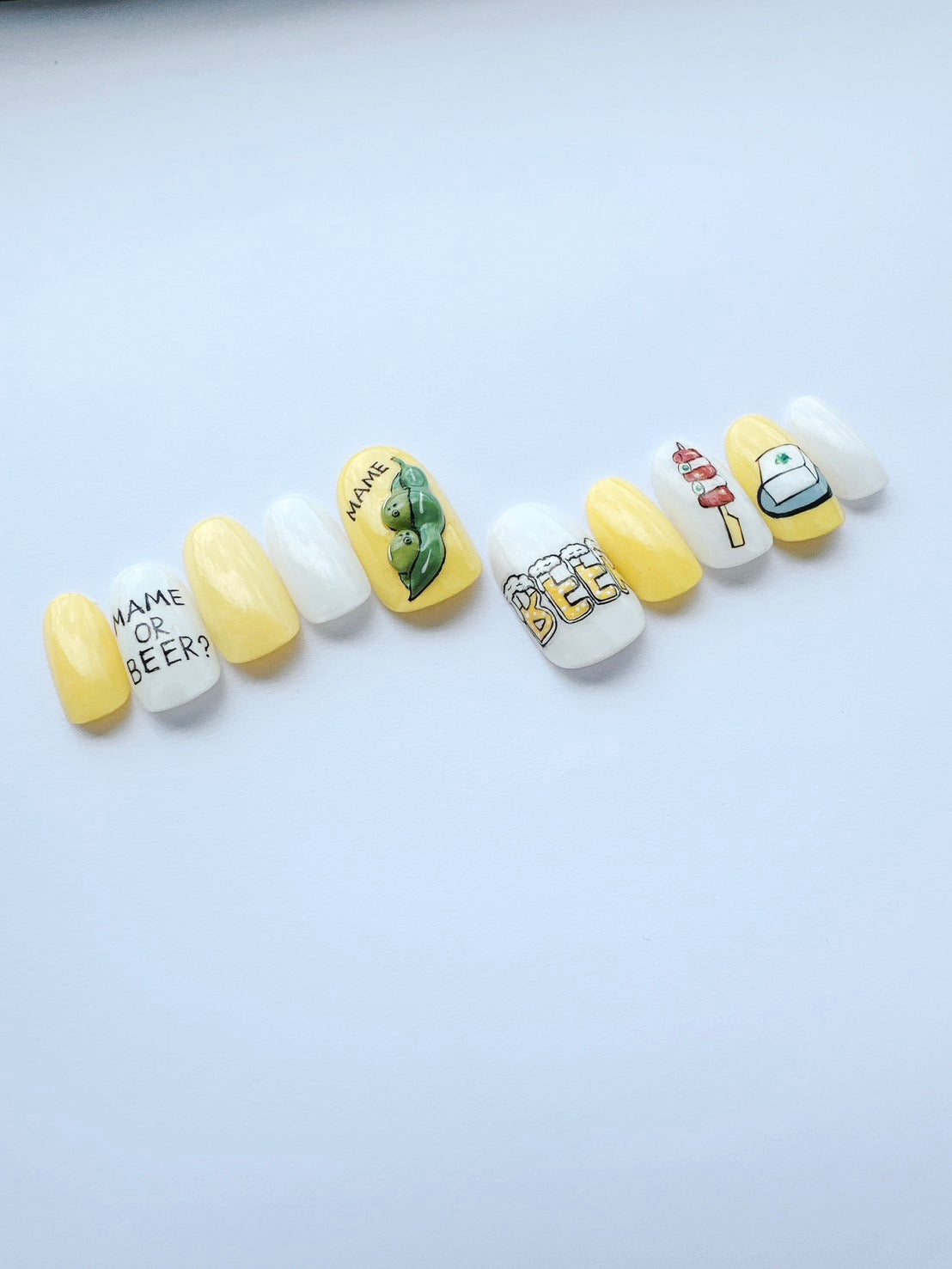 【nico nail×ナカタマサミ(オヒネリ2号)】謎のイラストネイル(華金)
