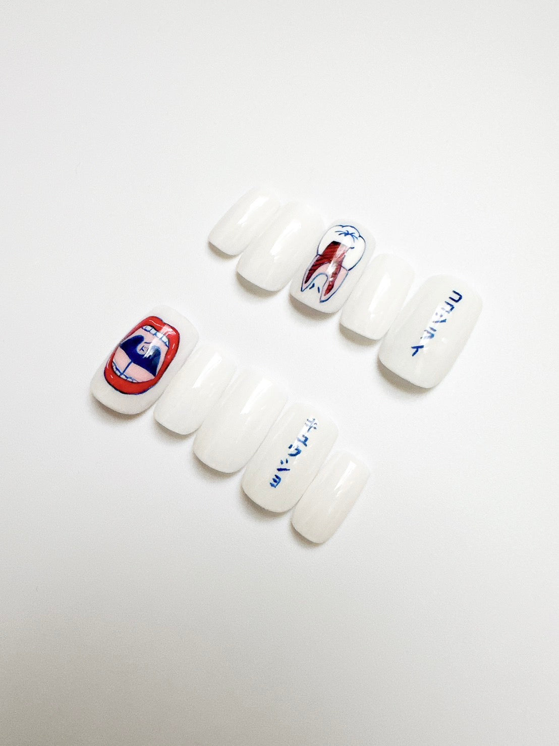 【nico nail×ナカタマサミ(オヒネリ2号)】謎のイラストネイル(口、歯)
